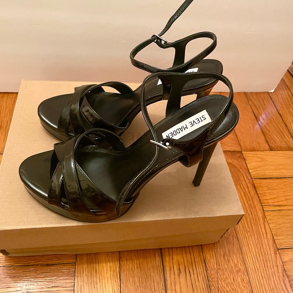 Open Toed Black Patent Sandals.